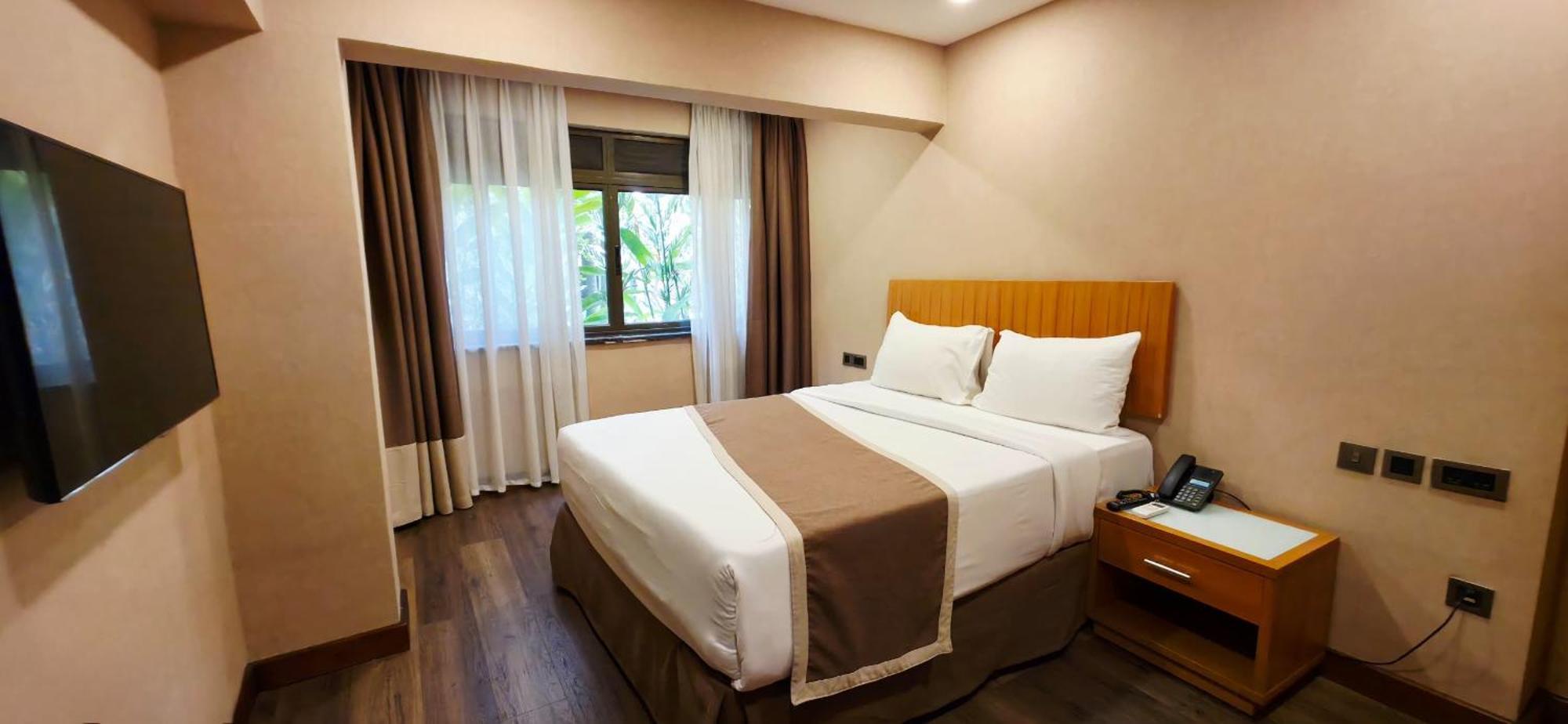 Speke Apartments Wampewo Kampala Bagian luar foto